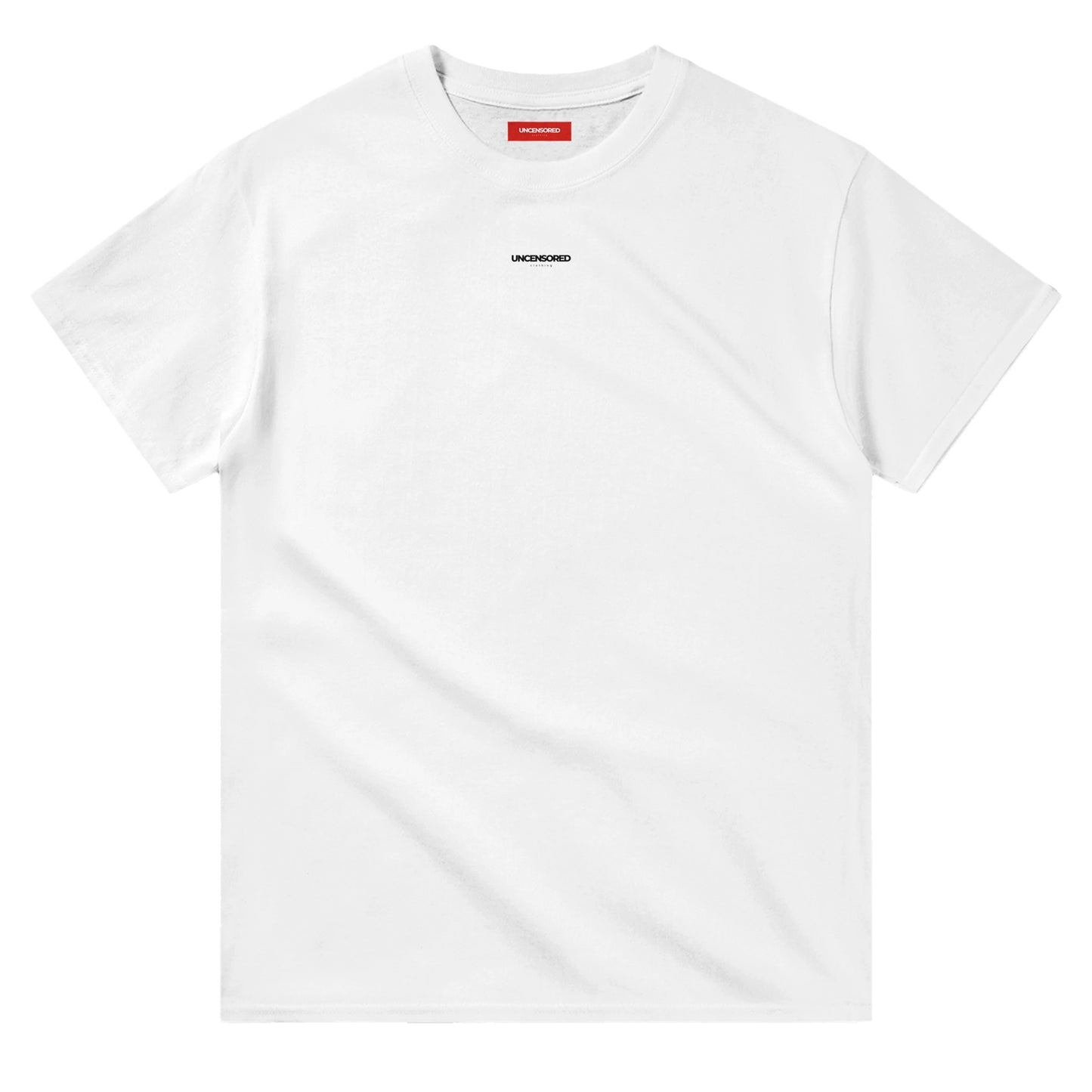 Flat-lay of a white T-shirt with a minimalist "UNCENSORED" logo printed on the chest. The T-shirt features a classic crewneck and a red interior label for branding.