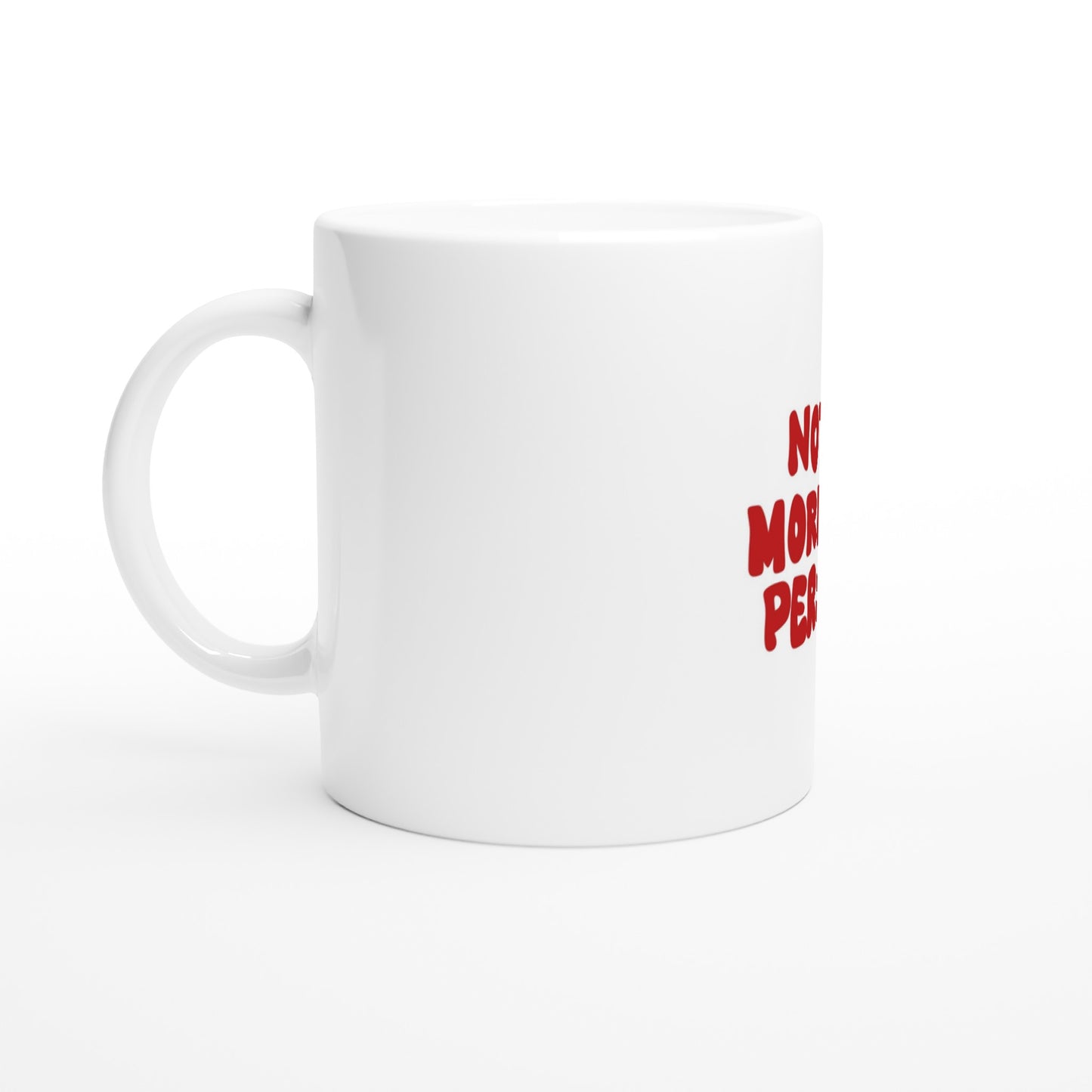 White ceramic coffee mug with bold red text that reads "NOT A MORNING PERSON." Perfect for caffeine lovers and night owls who hate early mornings.