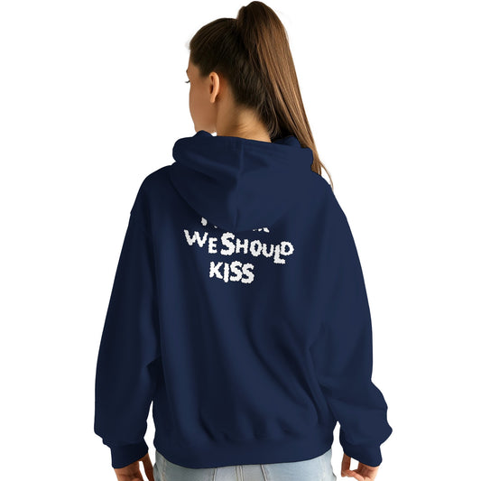 Back view of a navy blue hoodie worn by a female model, featuring black handwritten-style text that reads "I think we should kiss." A cozy and playful design perfect for casual and romantic vibes.