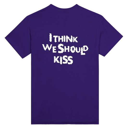Back view of a purple T-shirt featuring the phrase "I THINK WE SHOULD KISS" in bold, white, cloud-like typography. A playful and expressive statement piece.