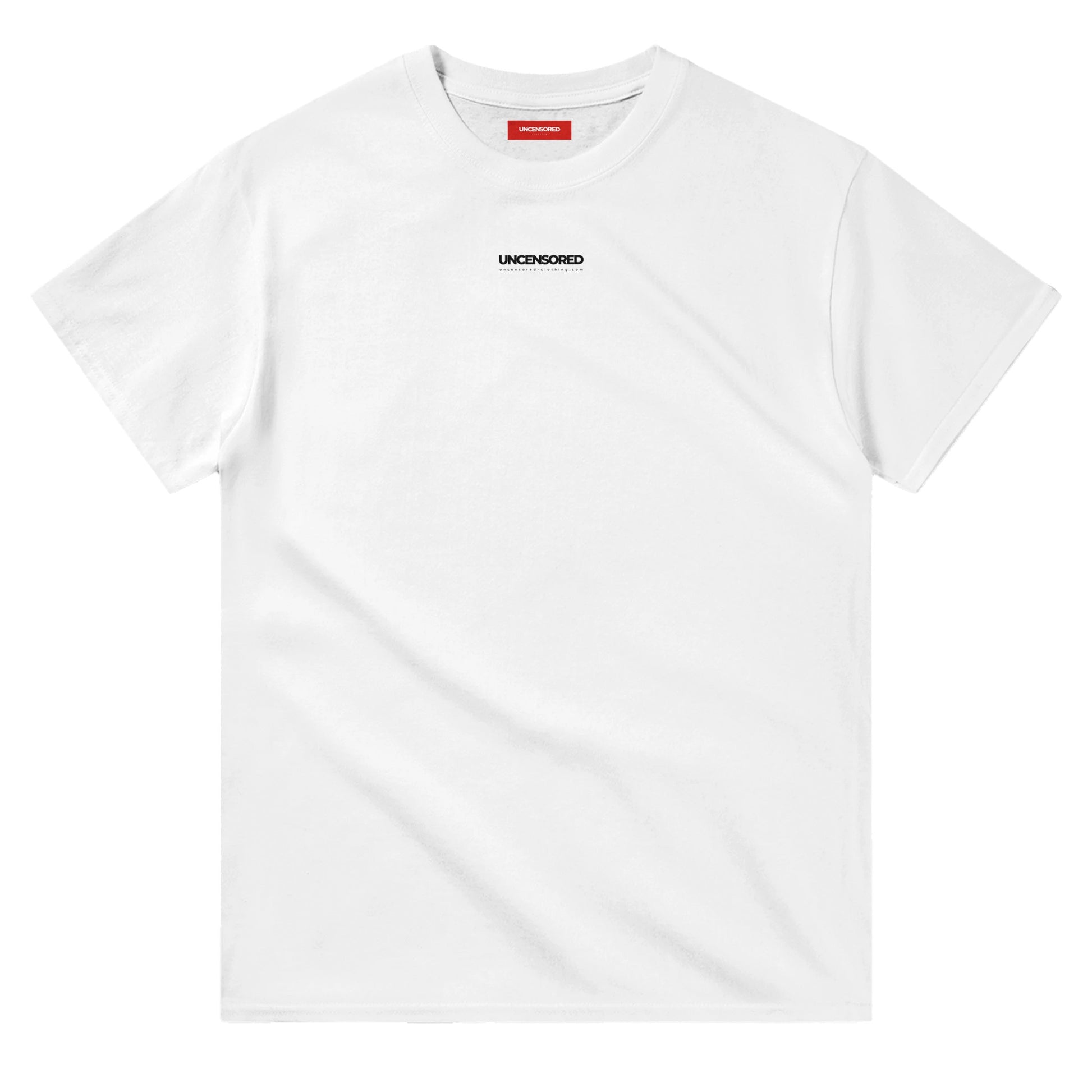 Flat lay of a white T-shirt featuring a minimalist "UNCENSORED" logo on the front. The design is clean and subtle, with a small black text print on the chest and a red branded neck label inside the collar. Made from premium cotton for a soft and comfortable fit.